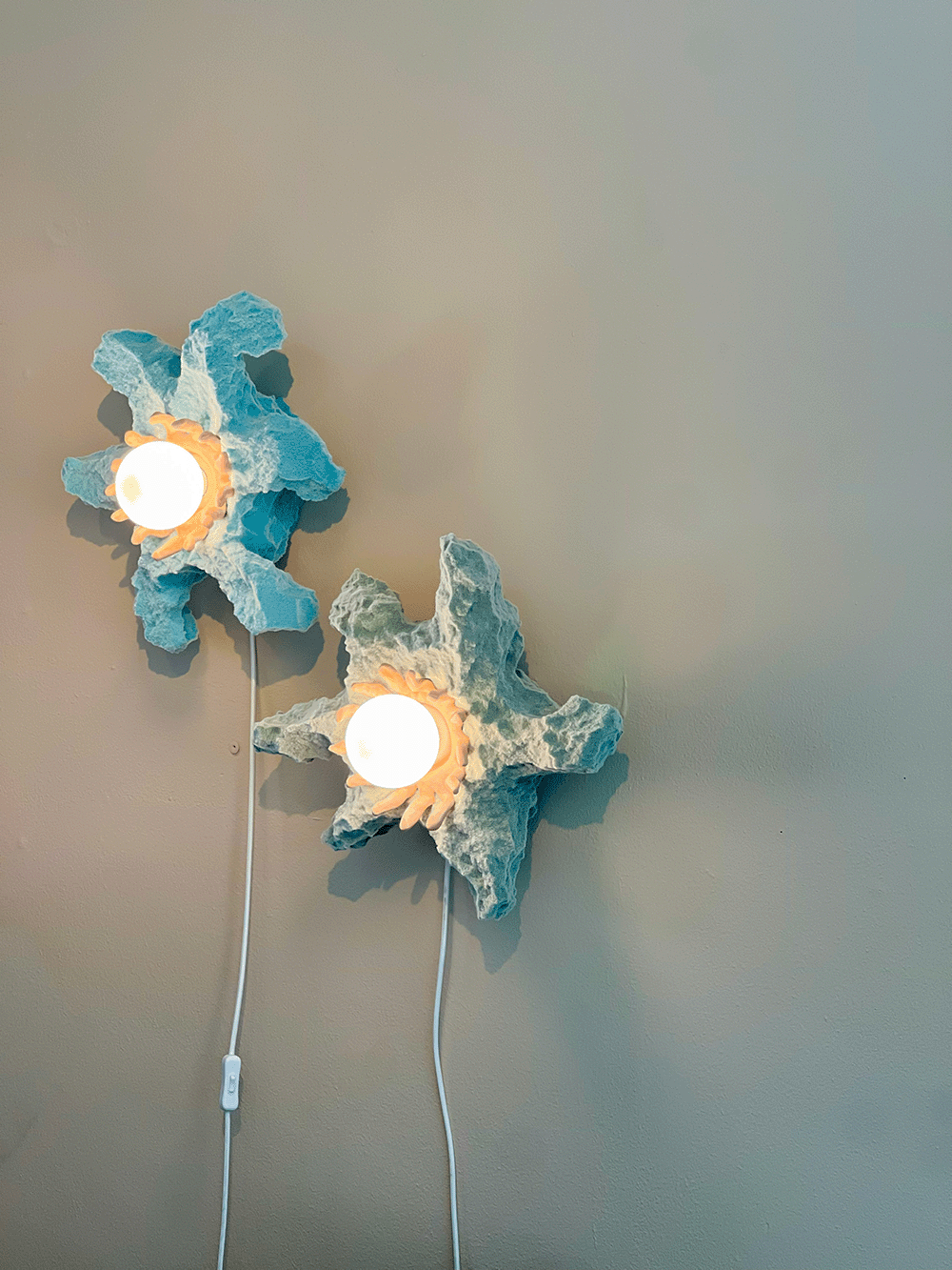 PRIMORDIAL ANTICS star wall lamp