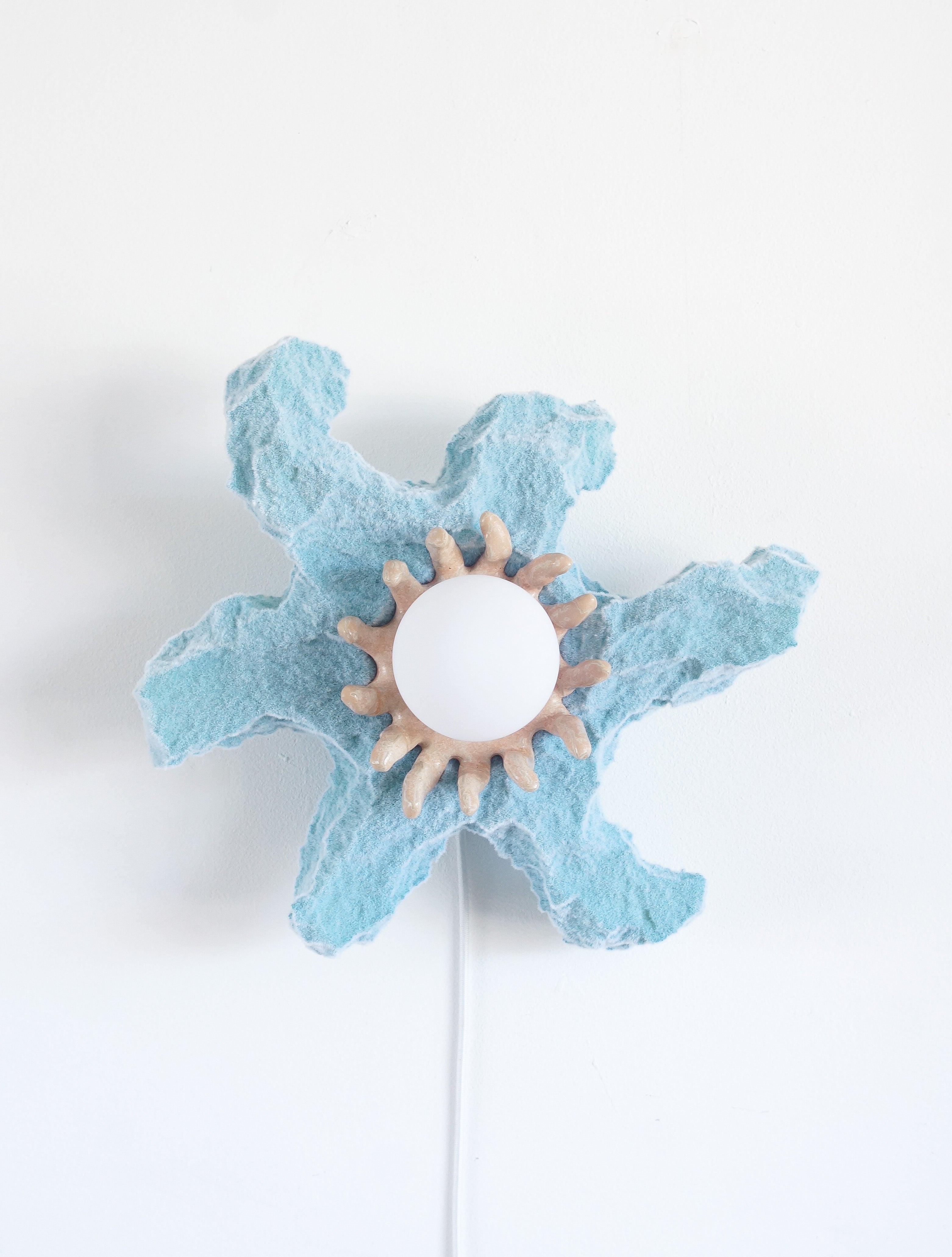 PRIMORDIAL ANTICS star wall lamp