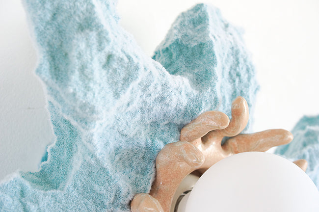 PRIMORDIAL ANTICS star wall lamp