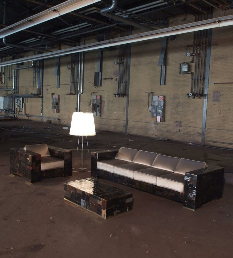 dark waste armchair in scrapwood